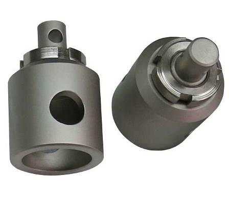 Male pin with external locking nut to female bore adapter